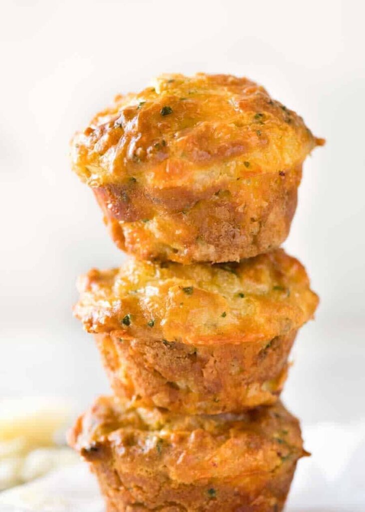 Close up photo of a stack of Savoury Cheese Muffins