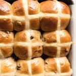 Easy Hot Cross Buns Recipe - perfectly spiced, fluffy and moist, with a no knead, no stand mixer option! www.reciptineats.com